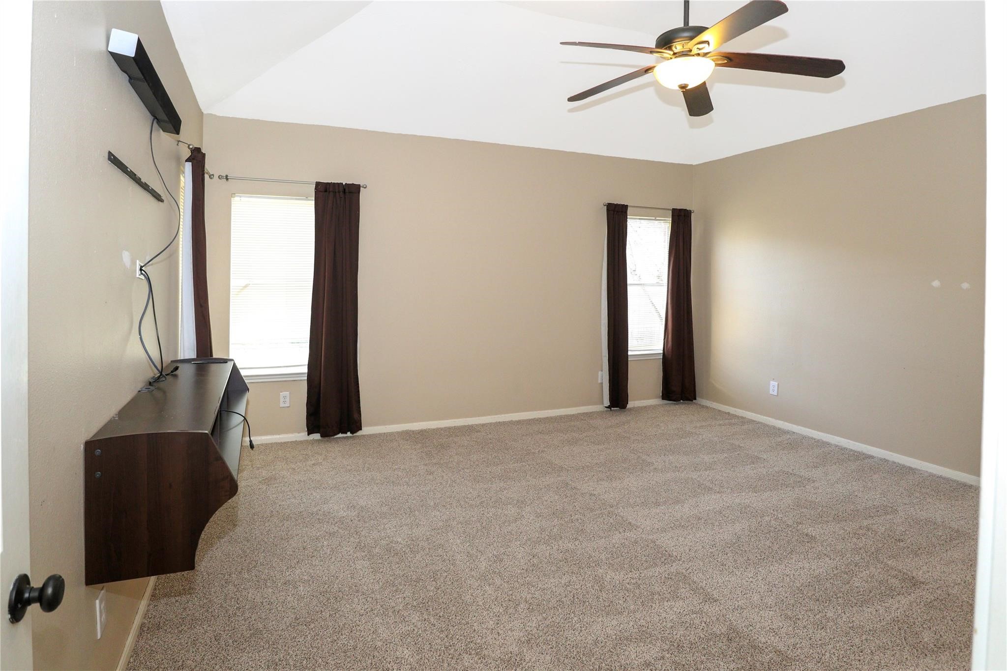 23207 Olive Ridge Court Katy, TX 77494 - Photo 27 of 45 a view of an empty room with a window