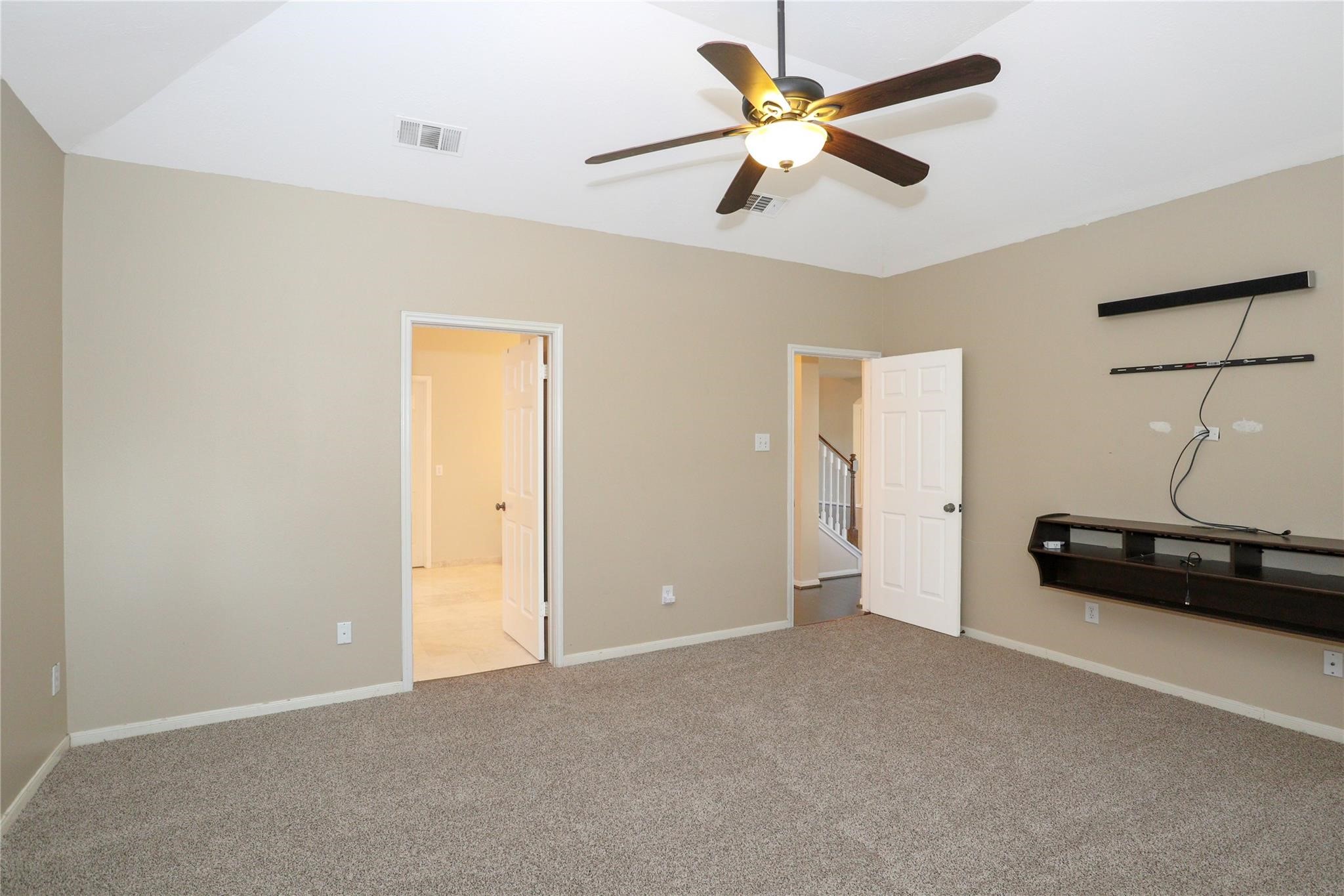 23207 Olive Ridge Court Katy, TX 77494 - Photo 28 of 45 a view of a livingroom with a ceiling fan and a ceiling fan