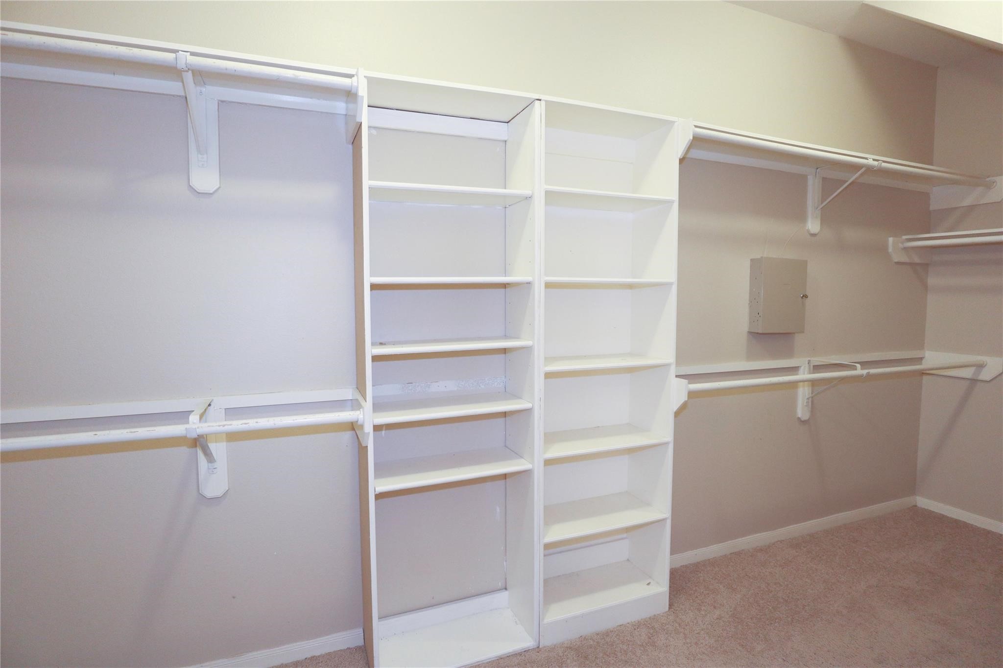 23207 Olive Ridge Court Katy, TX 77494 - Photo 31 of 45 a view of walk in closet with empty racks
