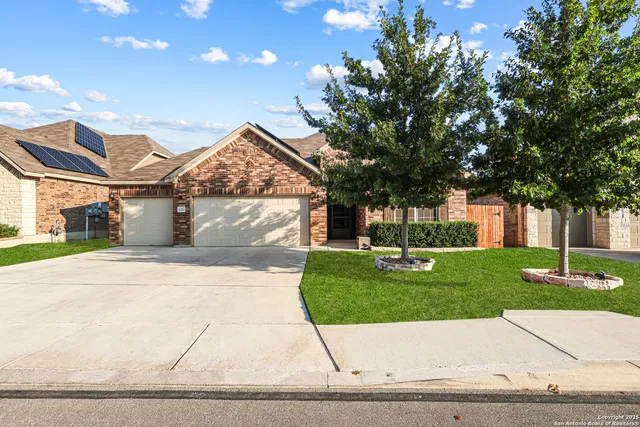 a view of a house with a garden