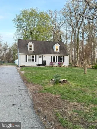 front view of house with a yard