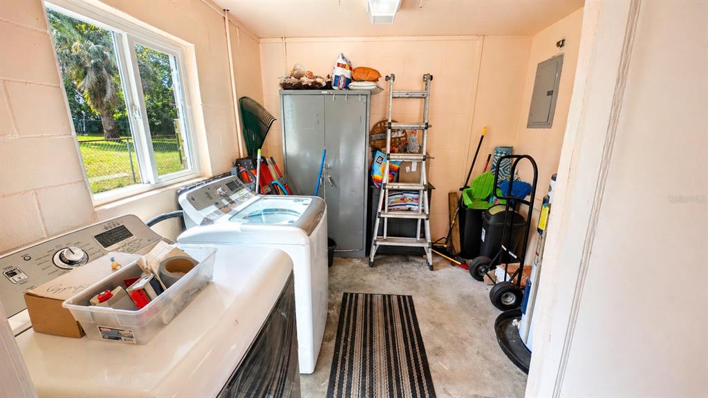 2 Clear Place Ocala, FL 34472 - Photo 23 of 23 a view of walk in closet with clothes and shoes