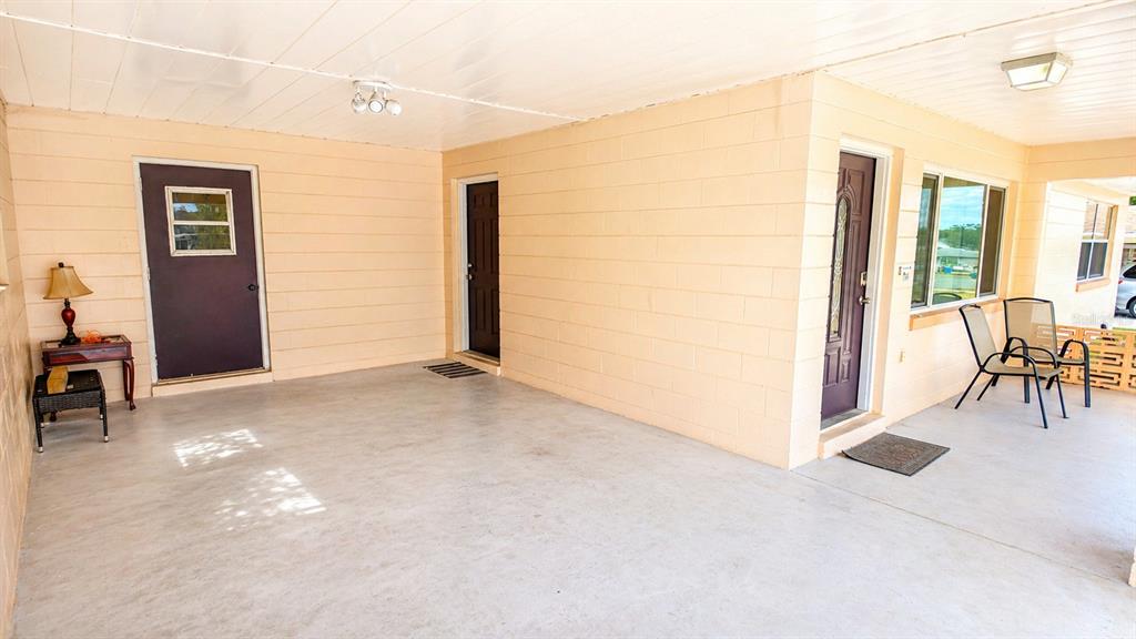2 Clear Place Ocala, FL 34472 - Photo 6 of 23 a view of livingroom with furniture and floor to ceiling window