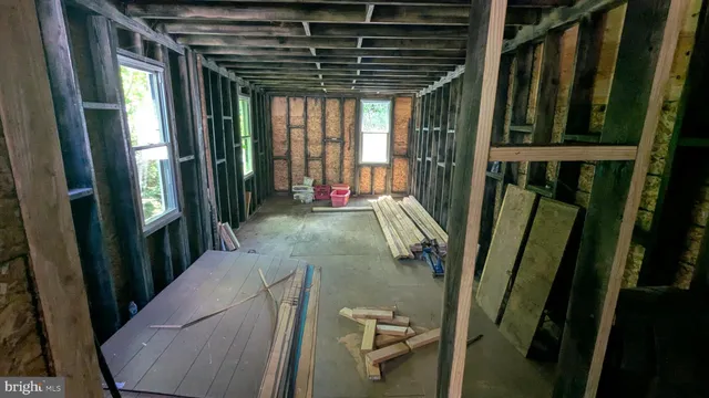 a view of an entryway with a small yard