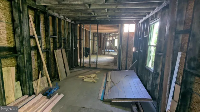 a view of backyard with cabin