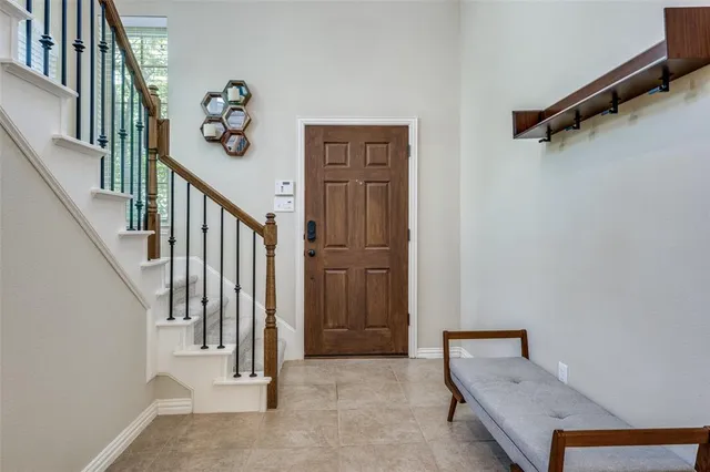 a view of a hallway with seating area