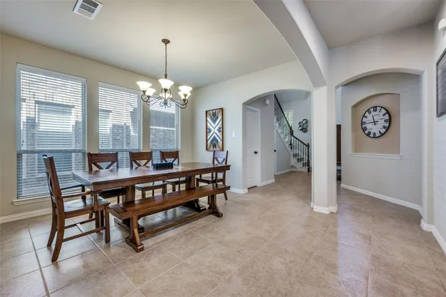 a view of a livingroom with furniture and window