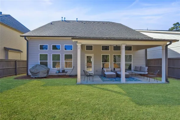 front view of a house with a yard