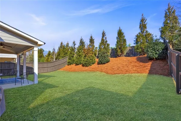 a view of a backyard with a garden