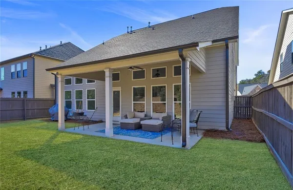 front view of a house with a yard