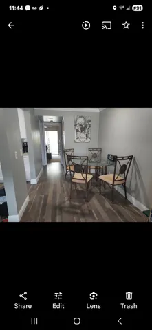 a view of a living room with furniture