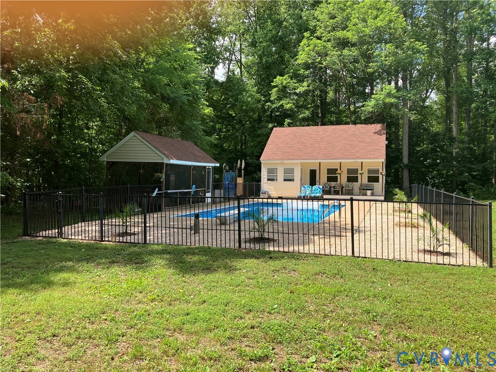 1375 Gills Road Powhatan, VA 23139 - Photo 9 of 10 Fenced in-ground pool with concrete surround, gues