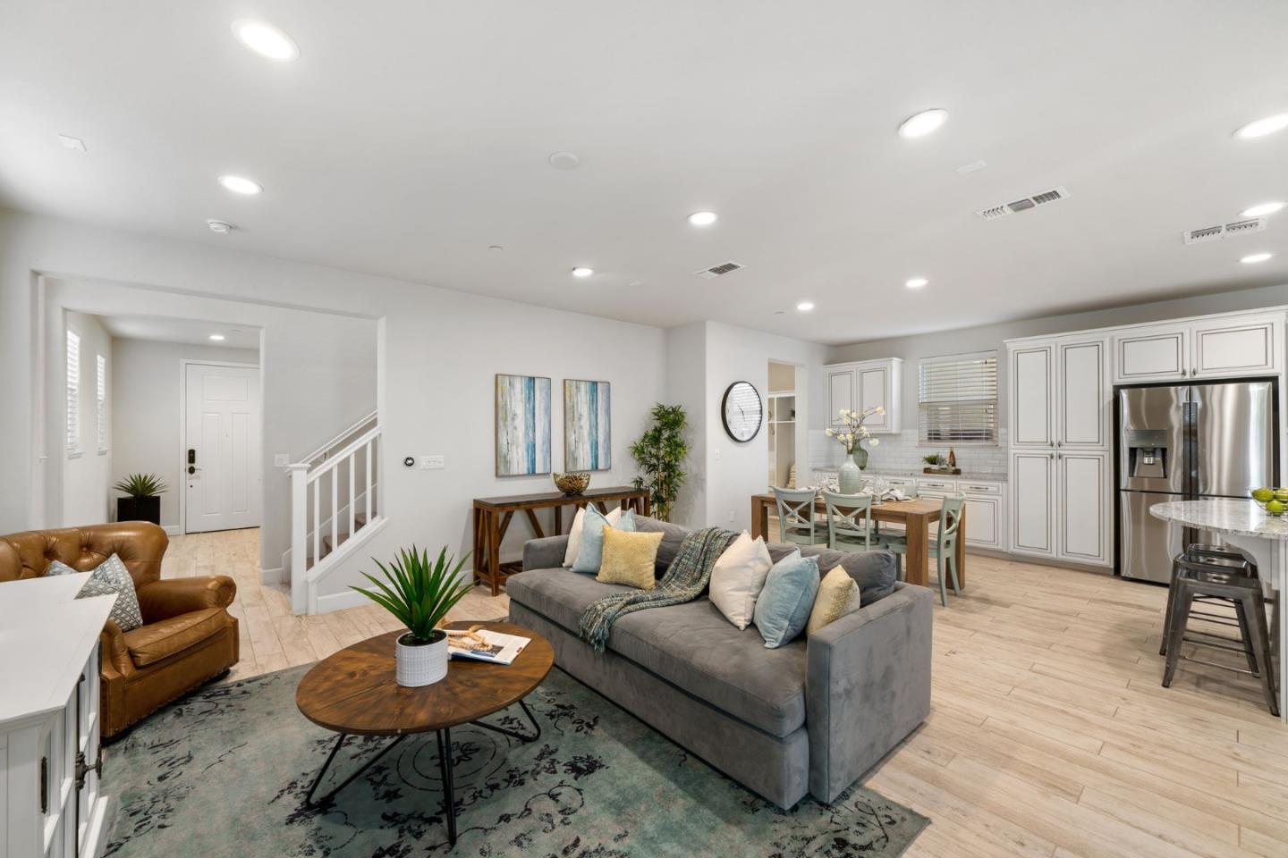 11958 Glaskin Place Dublin, CA 94568 - Photo 13 of 41 a living room with furniture and a wooden floor