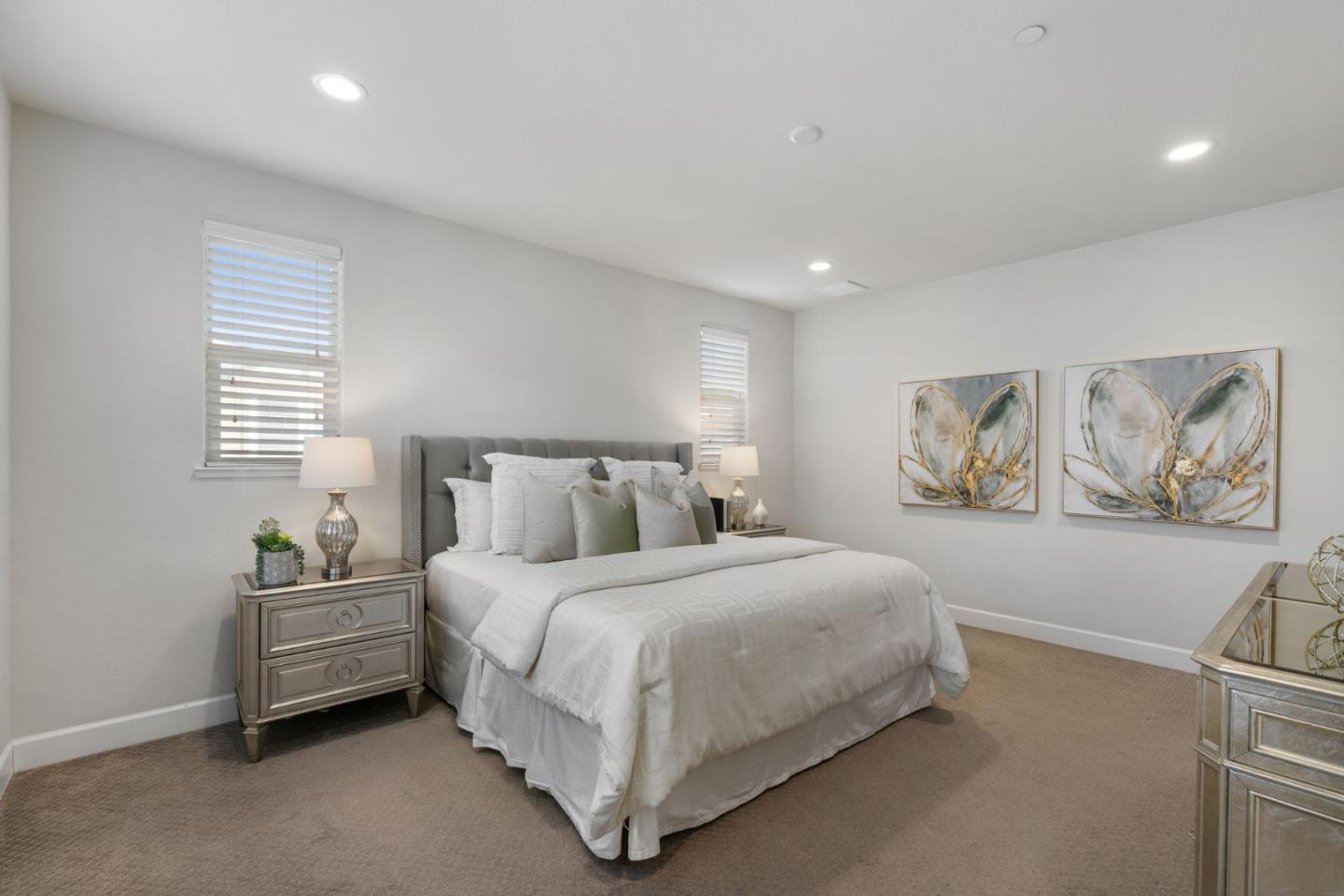 11958 Glaskin Place Dublin, CA 94568 - Photo 19 of 41 a bedroom with a bed and a painting on the wall