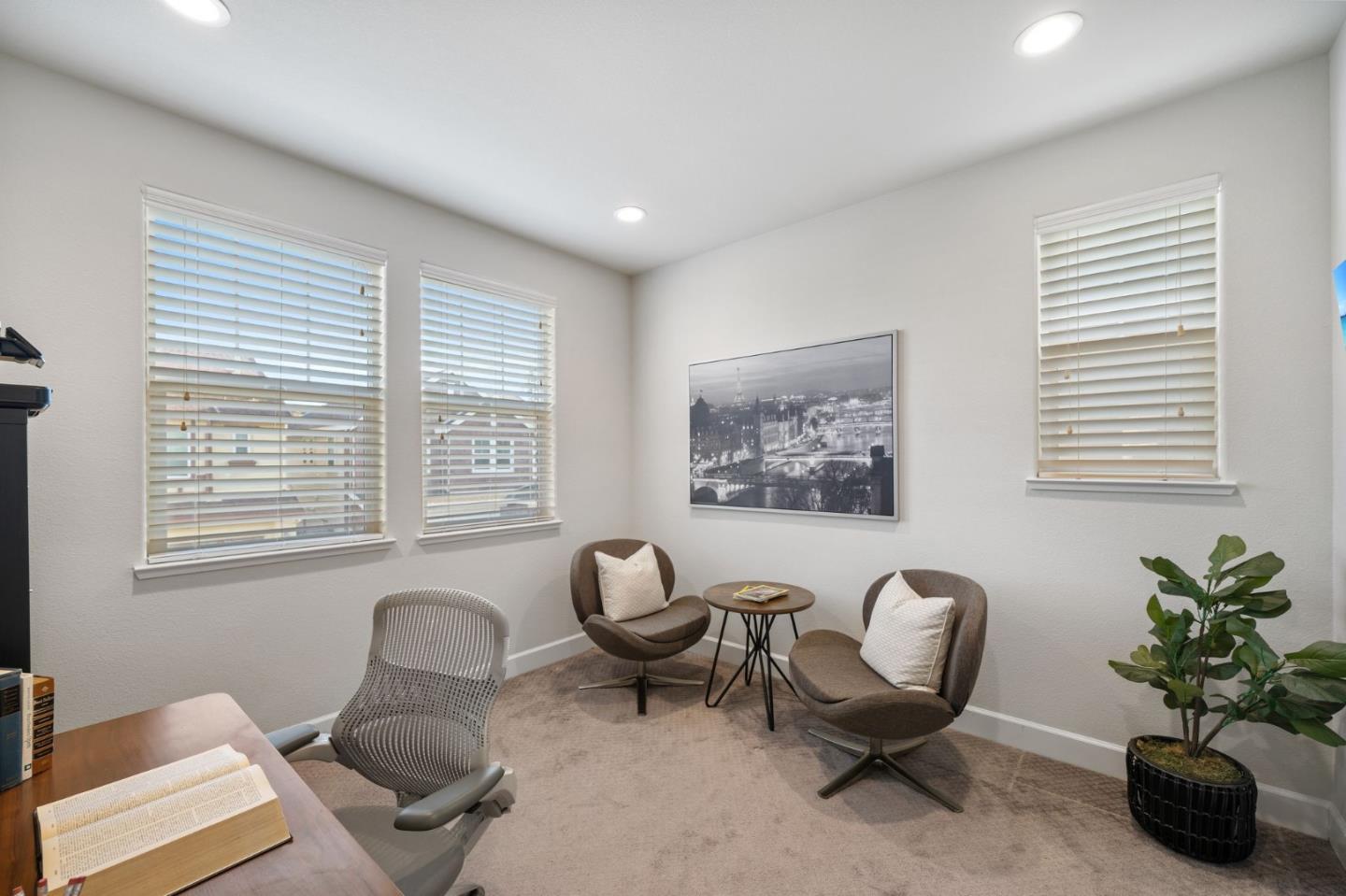 11958 Glaskin Place Dublin, CA 94568 - Photo 28 of 41 a living room with furniture potted plant and a window