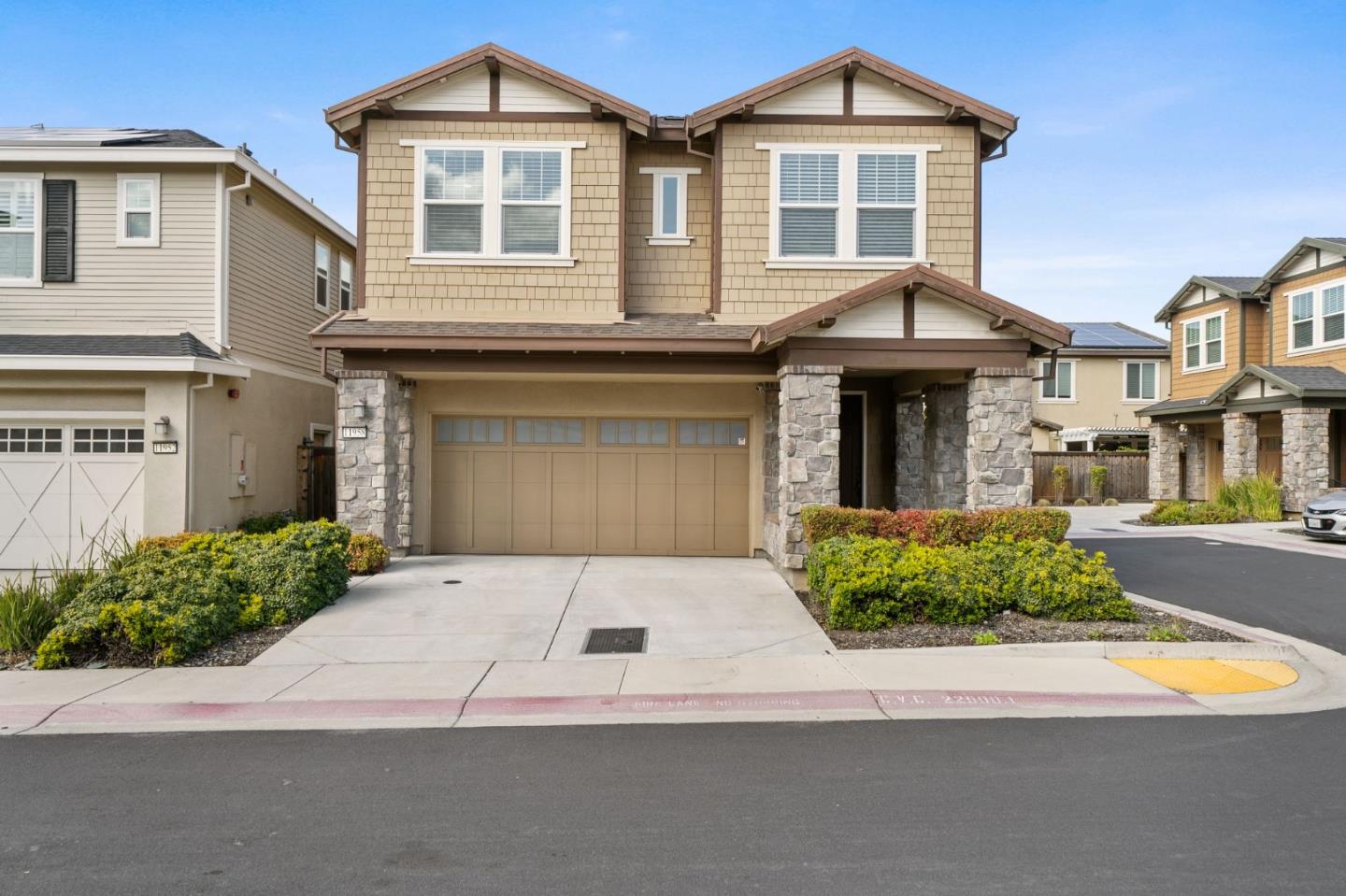 11958 Glaskin Place Dublin, CA 94568 - Photo 34 of 41 a front view of a house with a yard and garage