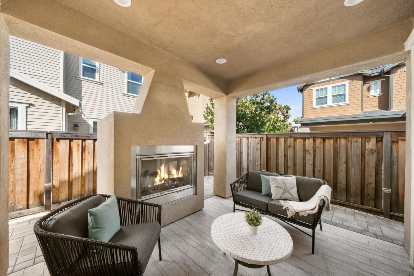 11958 Glaskin Place Dublin, CA 94568 - Photo 5 of 41 a living room with furniture and a fireplace
