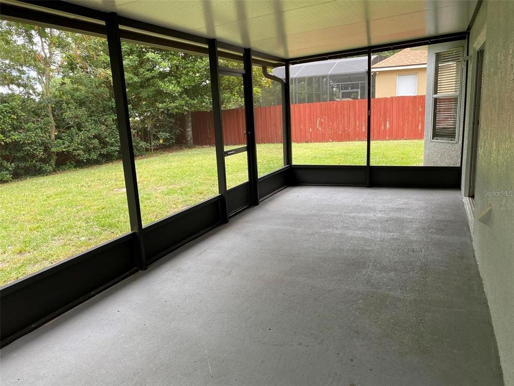 2778 Running Springs Loop Oviedo, FL 32765 - Photo 7 of 7 a view of an empty room with large windows