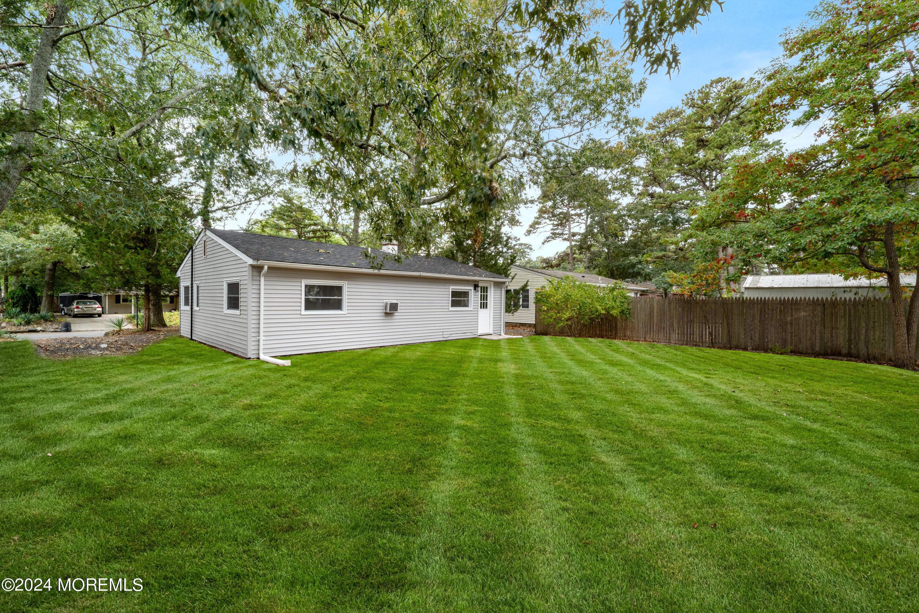 906 Tampa Road Forked River, NJ 08731 - Photo 18 of 21 a front view of house with a garden
