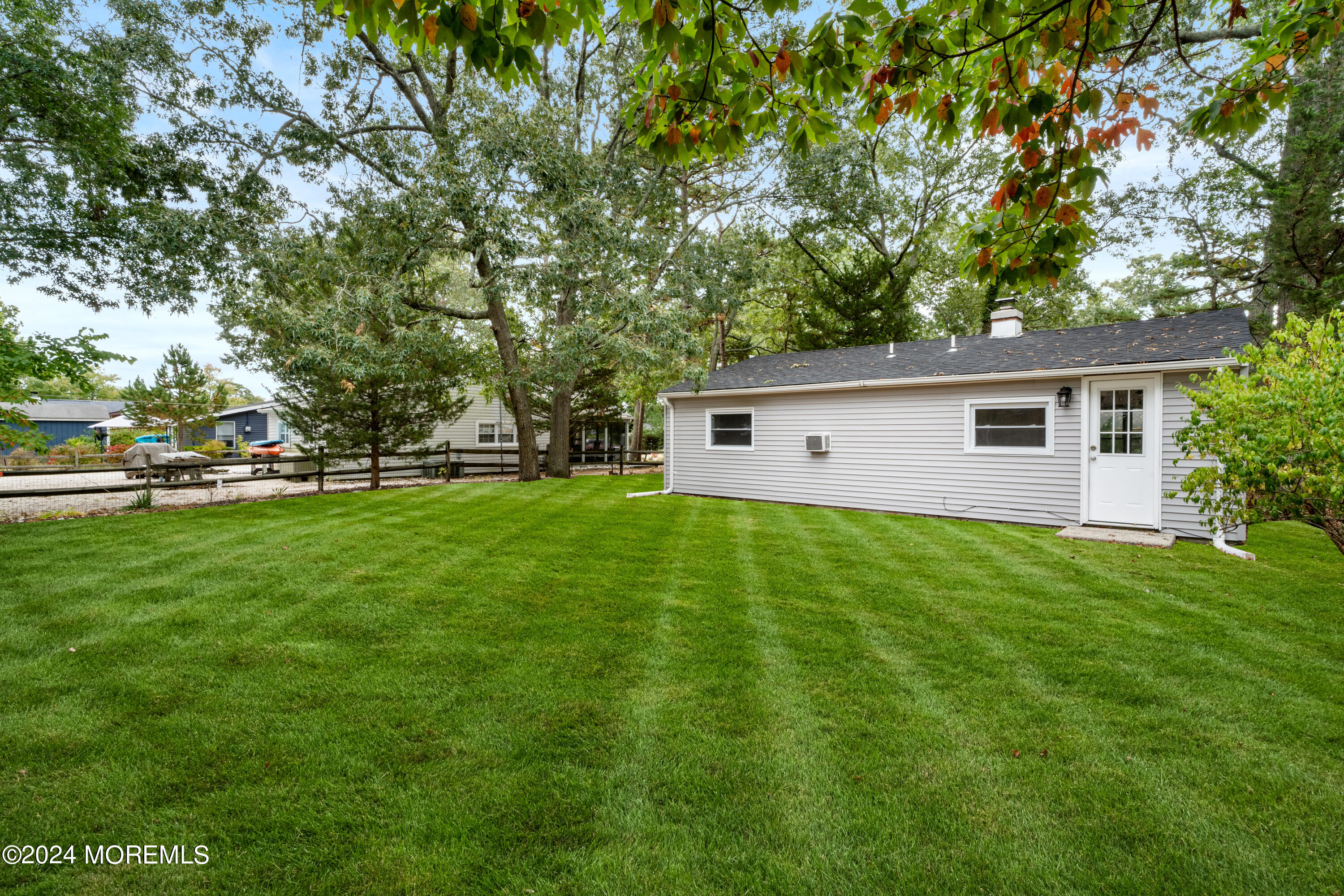 906 Tampa Road Forked River, NJ 08731 - Photo 20 of 21 a front view of house with yard and green space