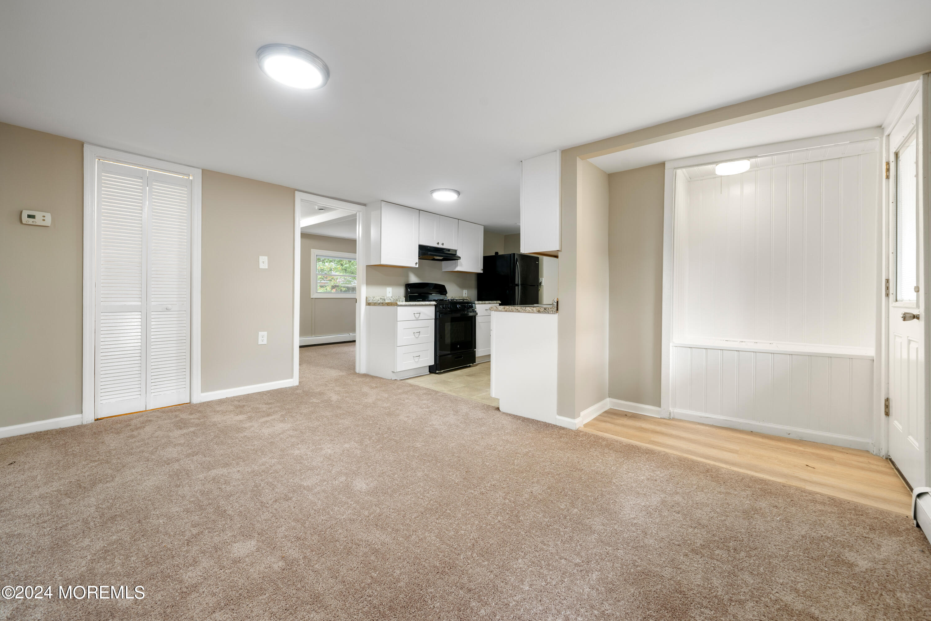 906 Tampa Road Forked River, NJ 08731 - Photo 4 of 21 a view of a kitchen with refrigerator and a sink