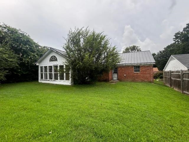 Expansive green lawn providing ample outdoor space
