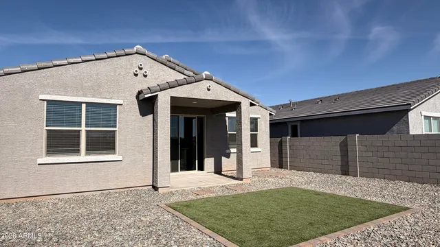a front view of a house with patio