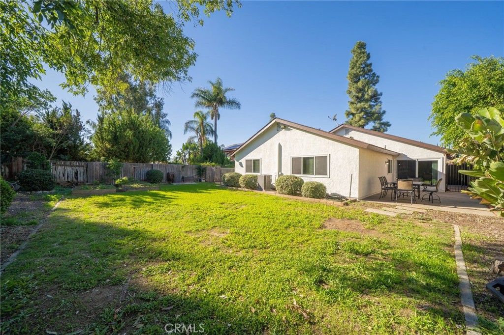 9121 Helms Avenue Rancho Cucamonga, CA 91730 - Photo 26 of 43 a front view of house with yard and swimming pool