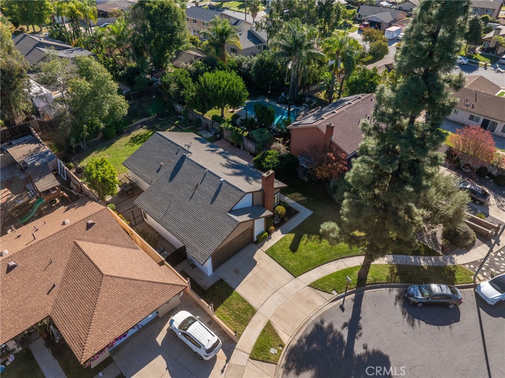 9121 Helms Avenue Rancho Cucamonga, CA 91730 - Photo 33 of 43 an aerial view of a house with a yard
