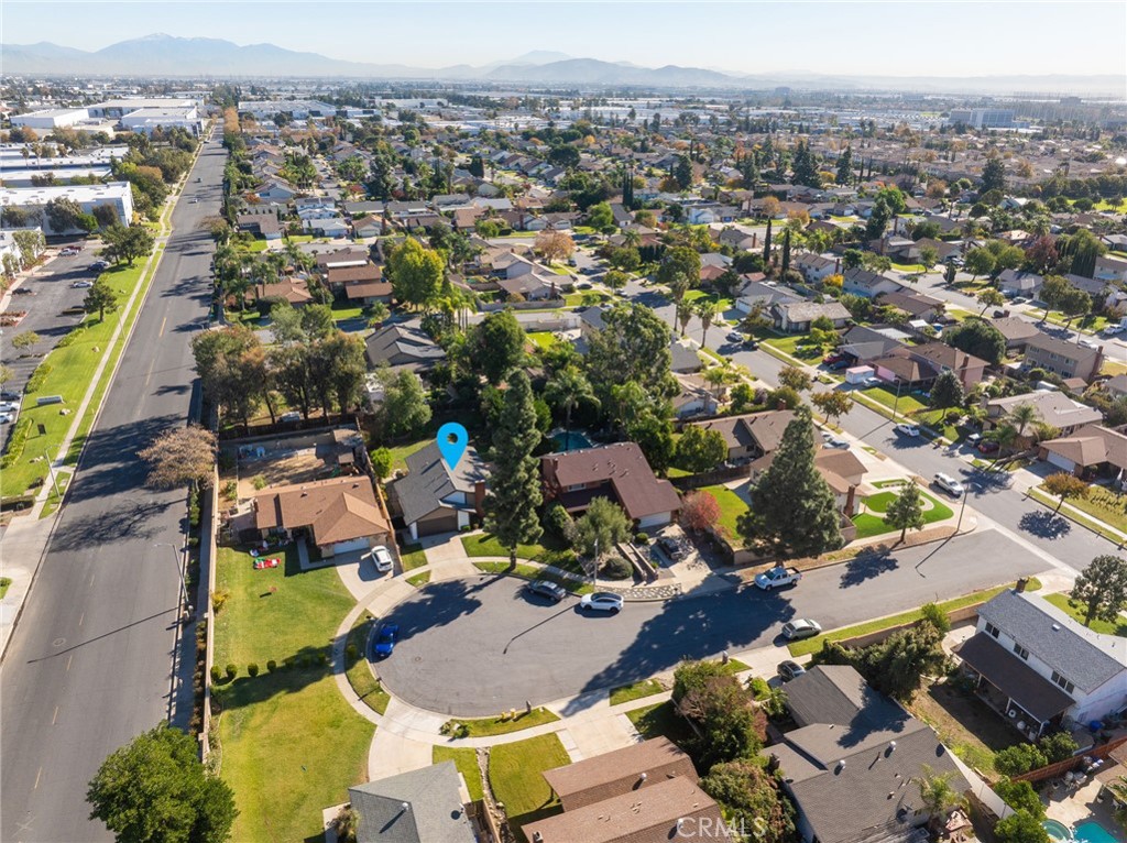 9121 Helms Avenue Rancho Cucamonga, CA 91730 - Photo 40 of 43 an aerial view of a houses with a swimming pool