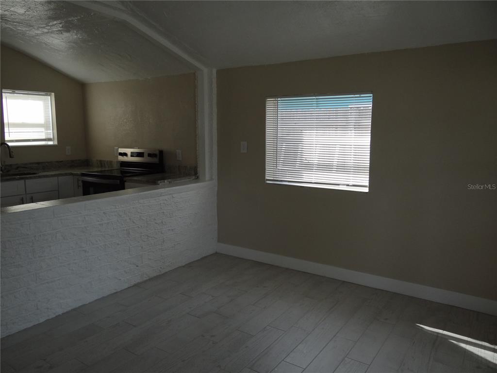 13360 Boca Ciega Avenue Madeira Beach, FL 33708 - Photo 15 of 45 a view of an empty room with a window