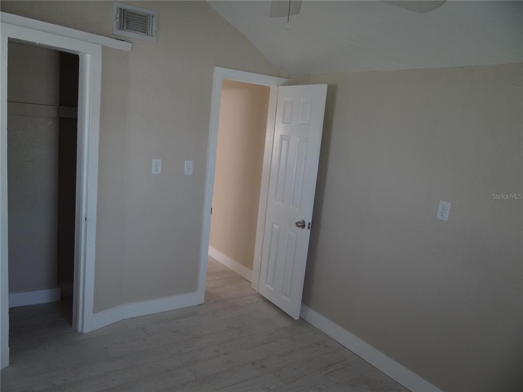 13360 Boca Ciega Avenue Madeira Beach, FL 33708 - Photo 18 of 45 a view of hallway with closet