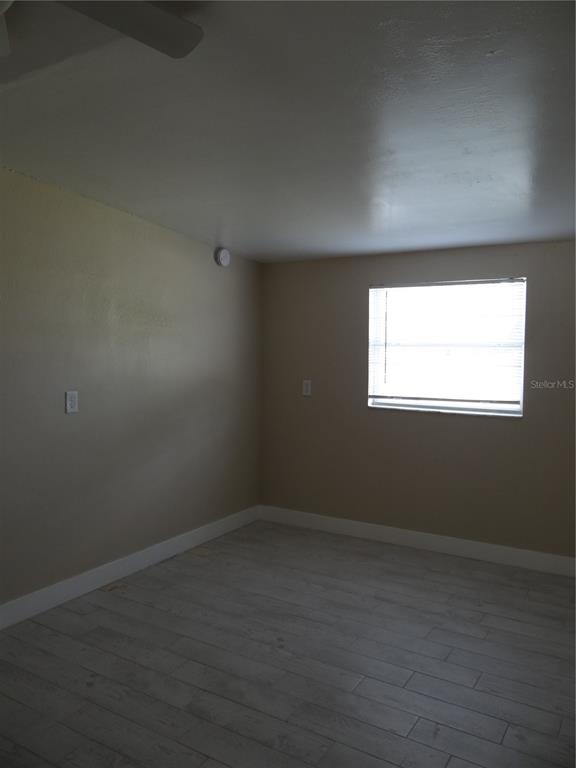 13360 Boca Ciega Avenue Madeira Beach, FL 33708 - Photo 25 of 45 an empty room with a window