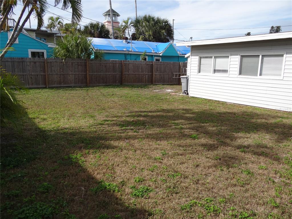 13360 Boca Ciega Avenue Madeira Beach, FL 33708 - Photo 32 of 45 a view of a backyard
