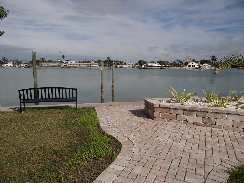 13360 Boca Ciega Avenue Madeira Beach, FL 33708 - Photo 43 of 45 a view of a terrace with chairs