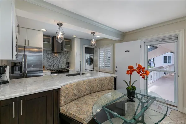 a view of a livingroom with furniture and rug