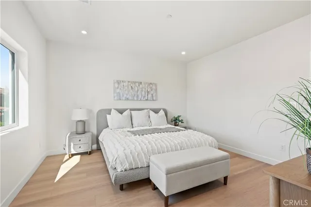 a vase of flowers sitting on a table chair