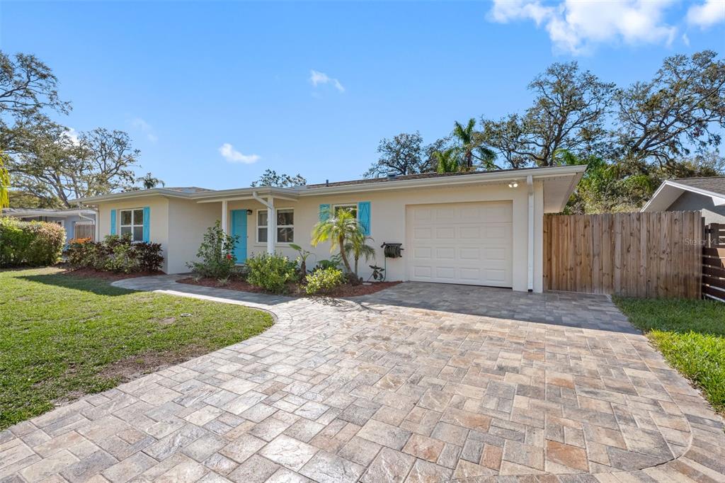 1095 Jackmar Road Dunedin, FL 34698 - Photo 1 of 1 a view of backyard of house with green space
