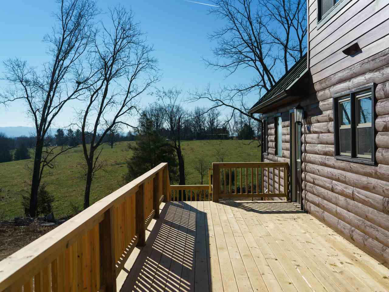 5541 Williams Run Road Port Republic, VA 24471 - Photo 9 of 48 a balcony with wooden floor and fence