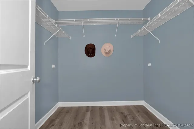 a view of a storage & utility room with a window