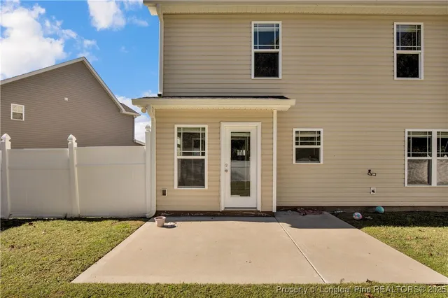 a front view of a house with yard
