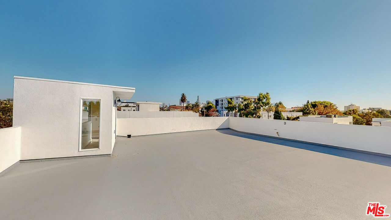 252 Rosemont Avenue, Unit 1/2 Los Angeles, CA 90026 - Photo 27 of 30 a view of a room with toys and toys