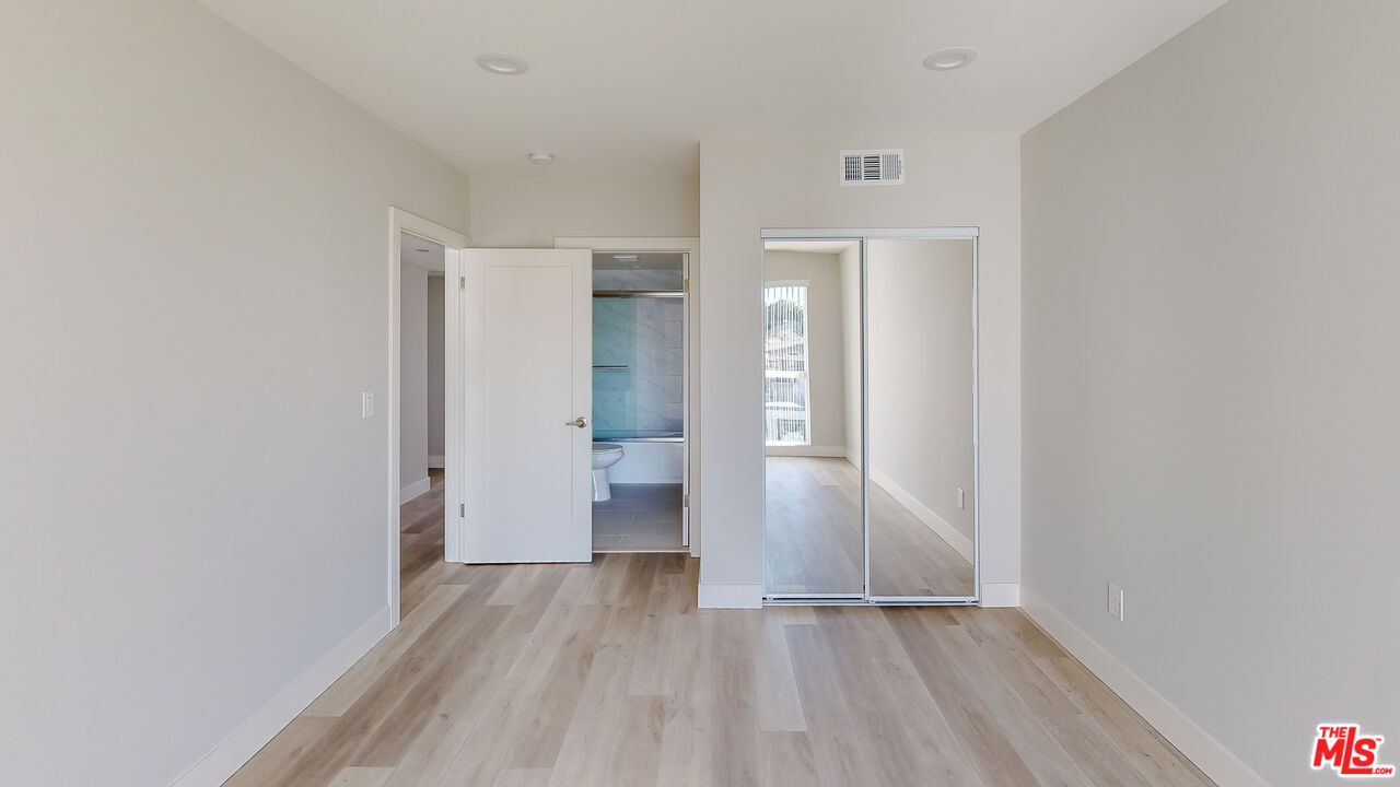 252 Rosemont Avenue, Unit 1/2 Los Angeles, CA 90026 - Photo 7 of 30 a view of hallway with wooden floor