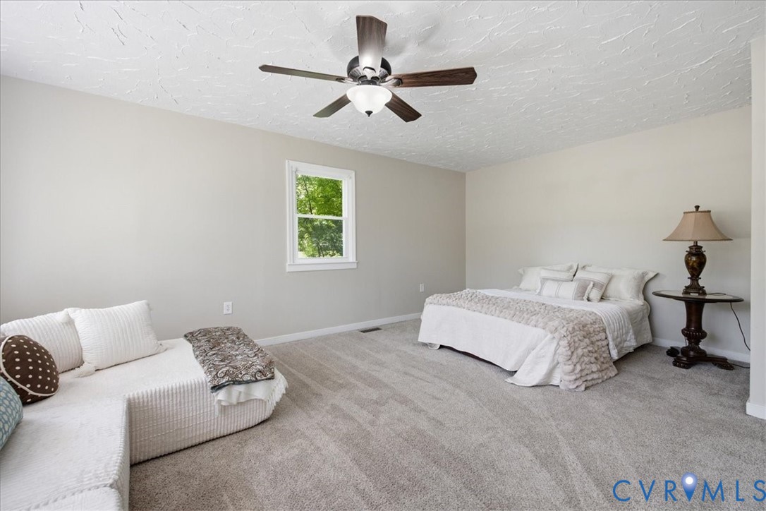 404 Bermuda Hundred Road Chester, VA 23836 - Photo 21 of 37 Spacious room featuring light-colored walls and so