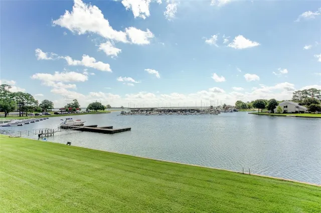 a view of a lake with houses
