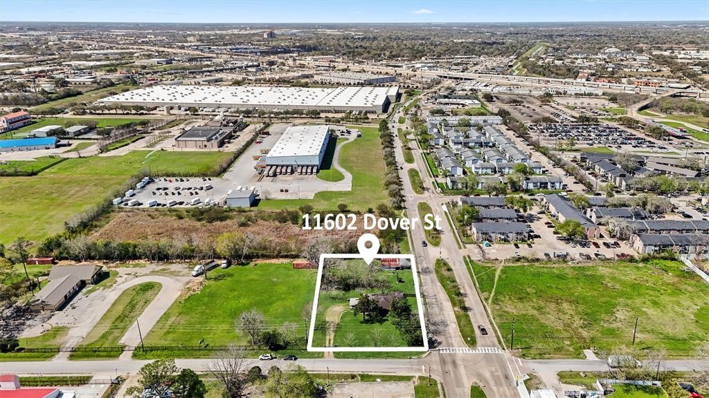 an aerial view of residential building and lake view