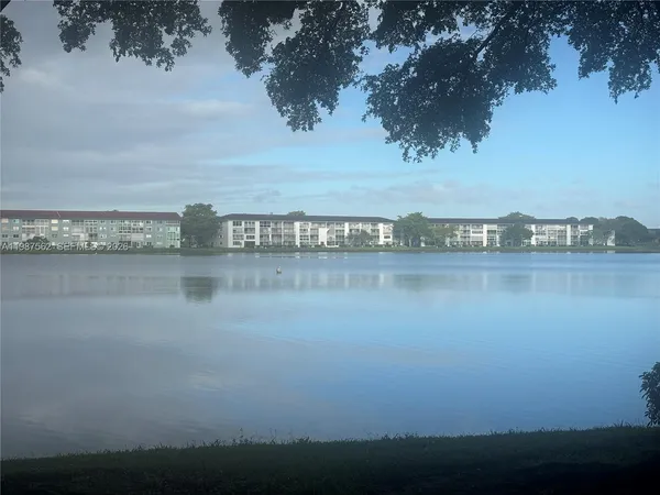 a view of a lake with a city