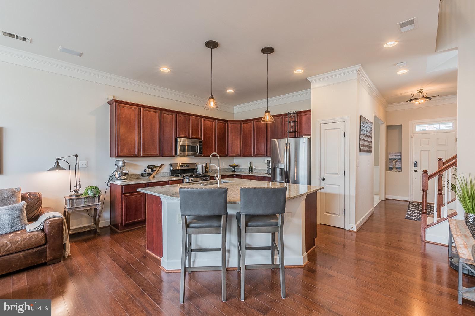 9010 Ribbon Falls Loop Bristow, VA 20136 - Photo 17 of 44 Kitchen/Living Room