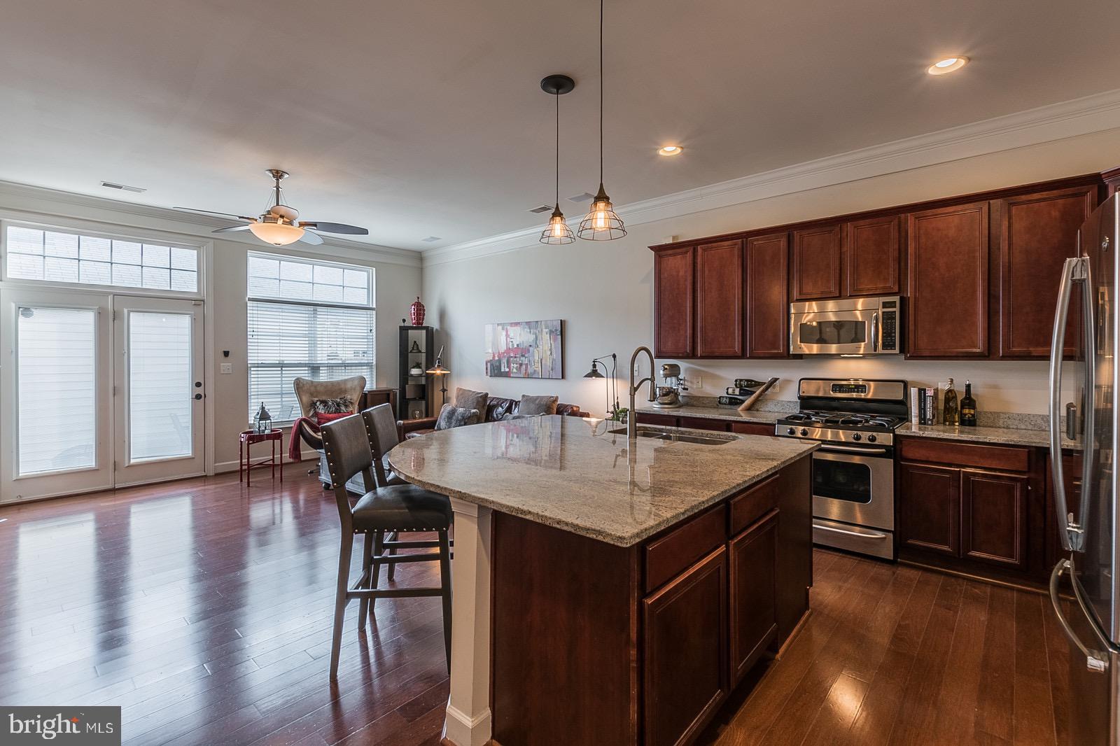 9010 Ribbon Falls Loop Bristow, VA 20136 - Photo 10 of 44 Kitchen/Living Room