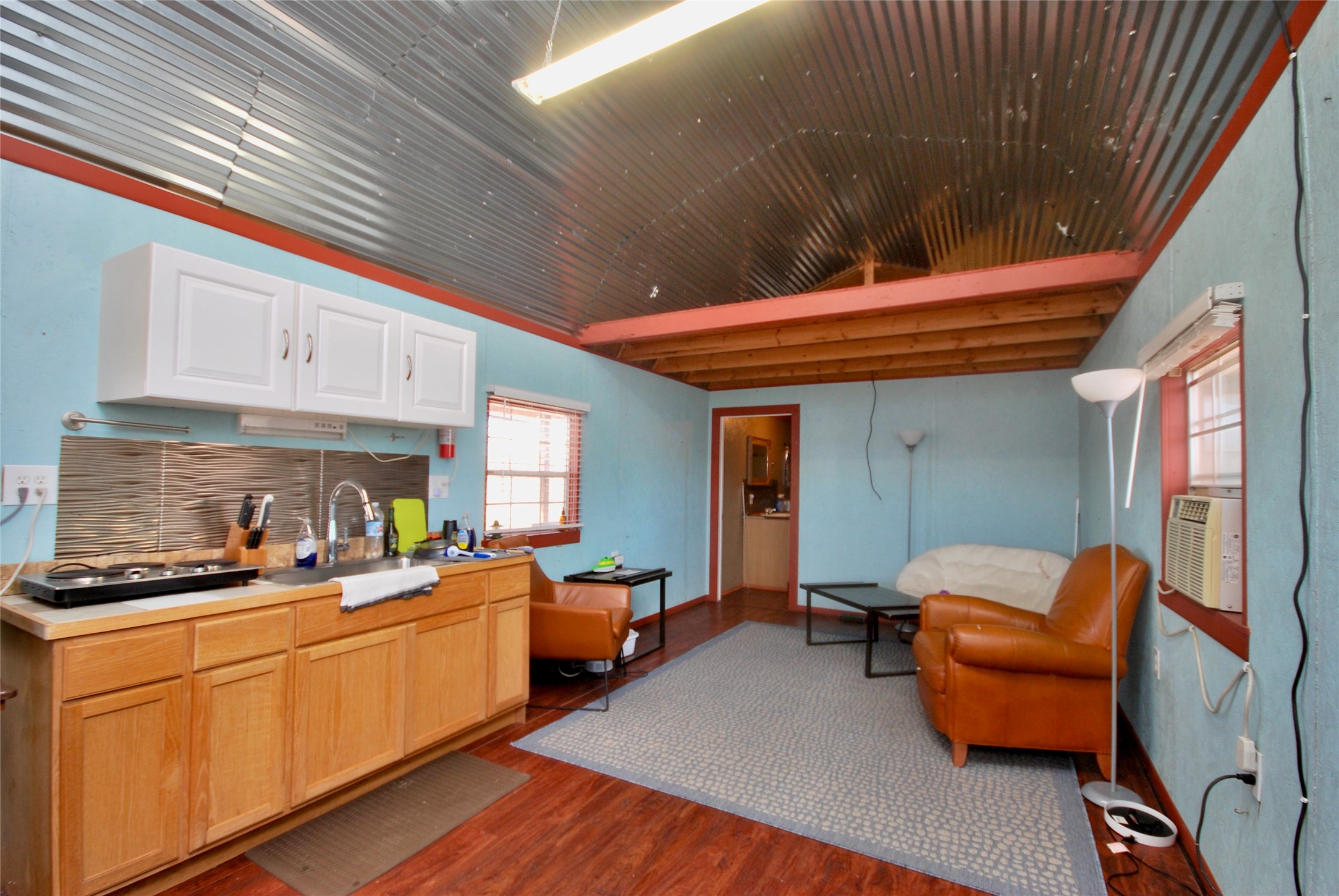 4850 Burke Road Flatonia, TX 78941 - Photo 14 of 45 a kitchen with furniture and window